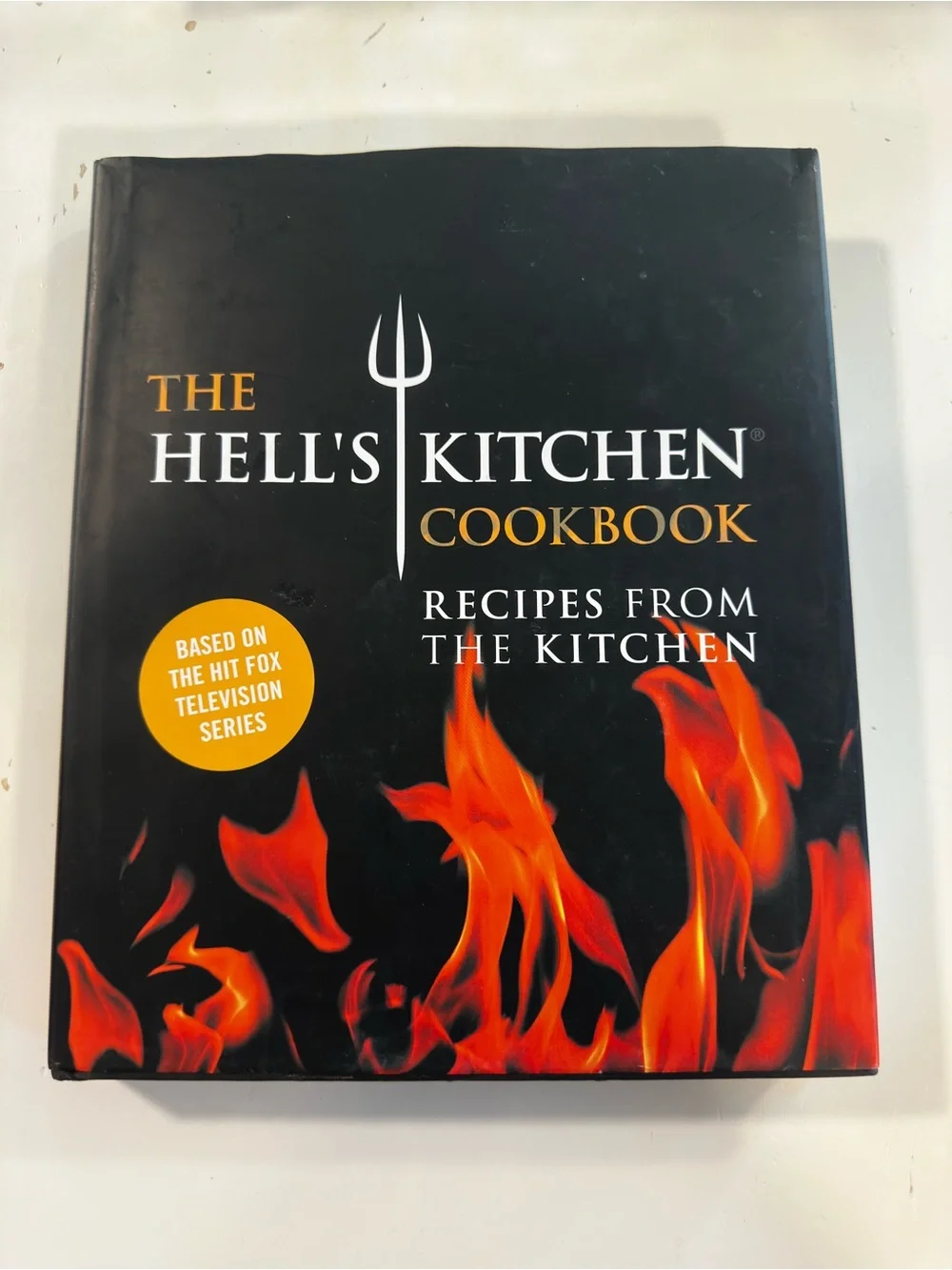 The Hell's Kitchen Cookbook - Black with Red/Orange Flame Design